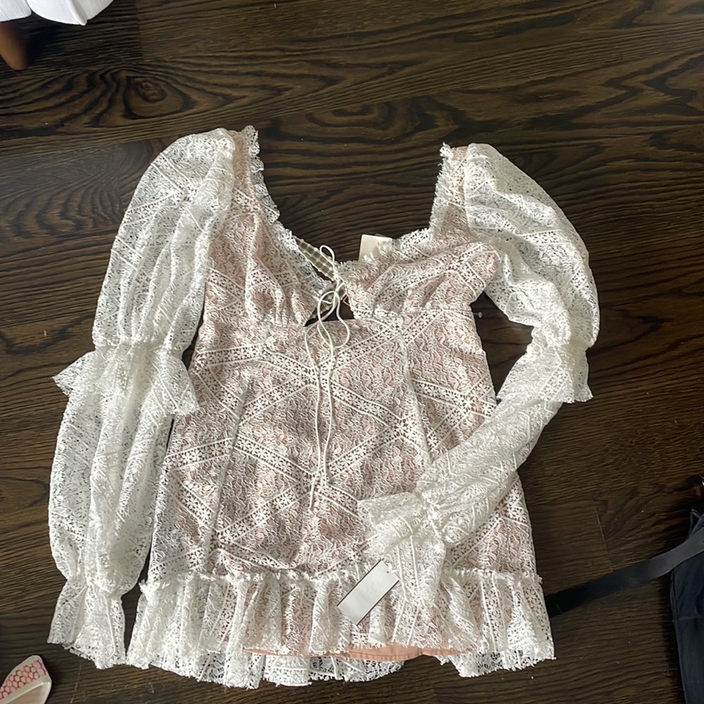 For love and lemons, dress size large, never